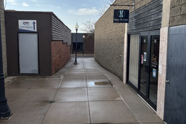 Fulton office PIC with hanging sign